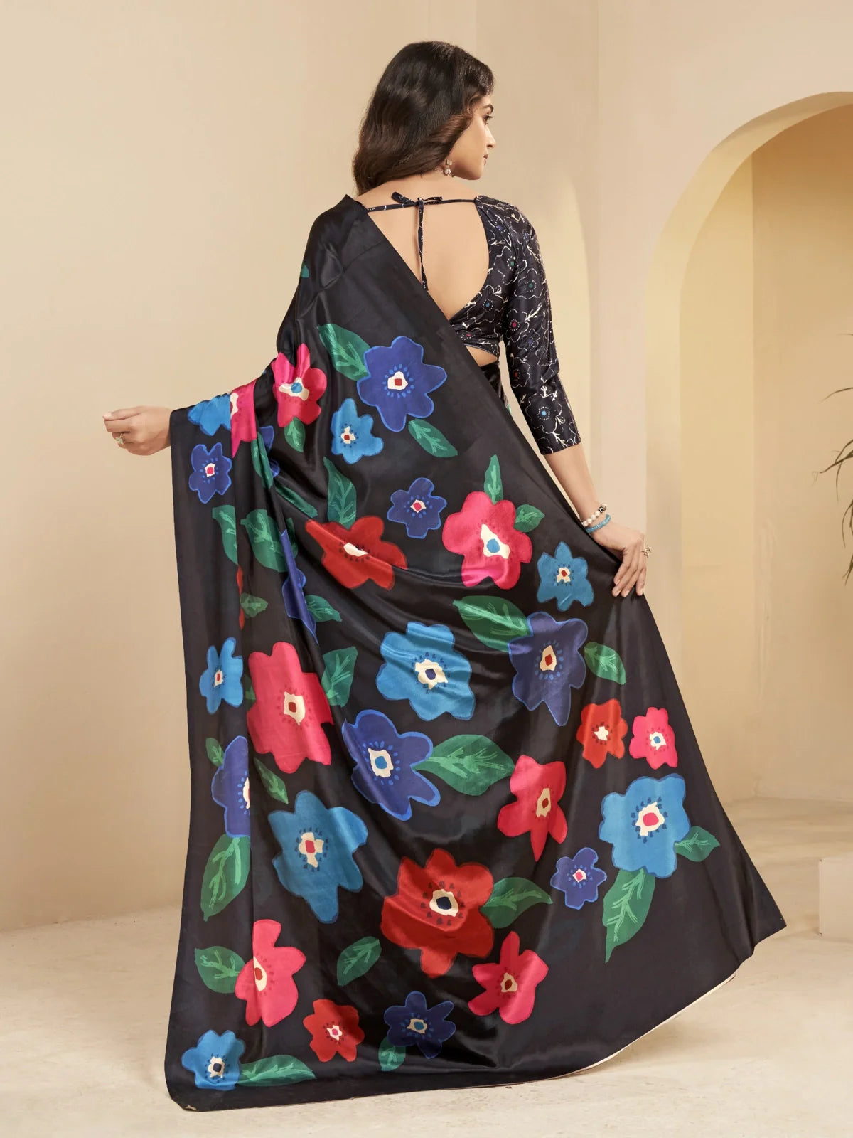 Tarani black party wear saree back view showcasing full floral digital print