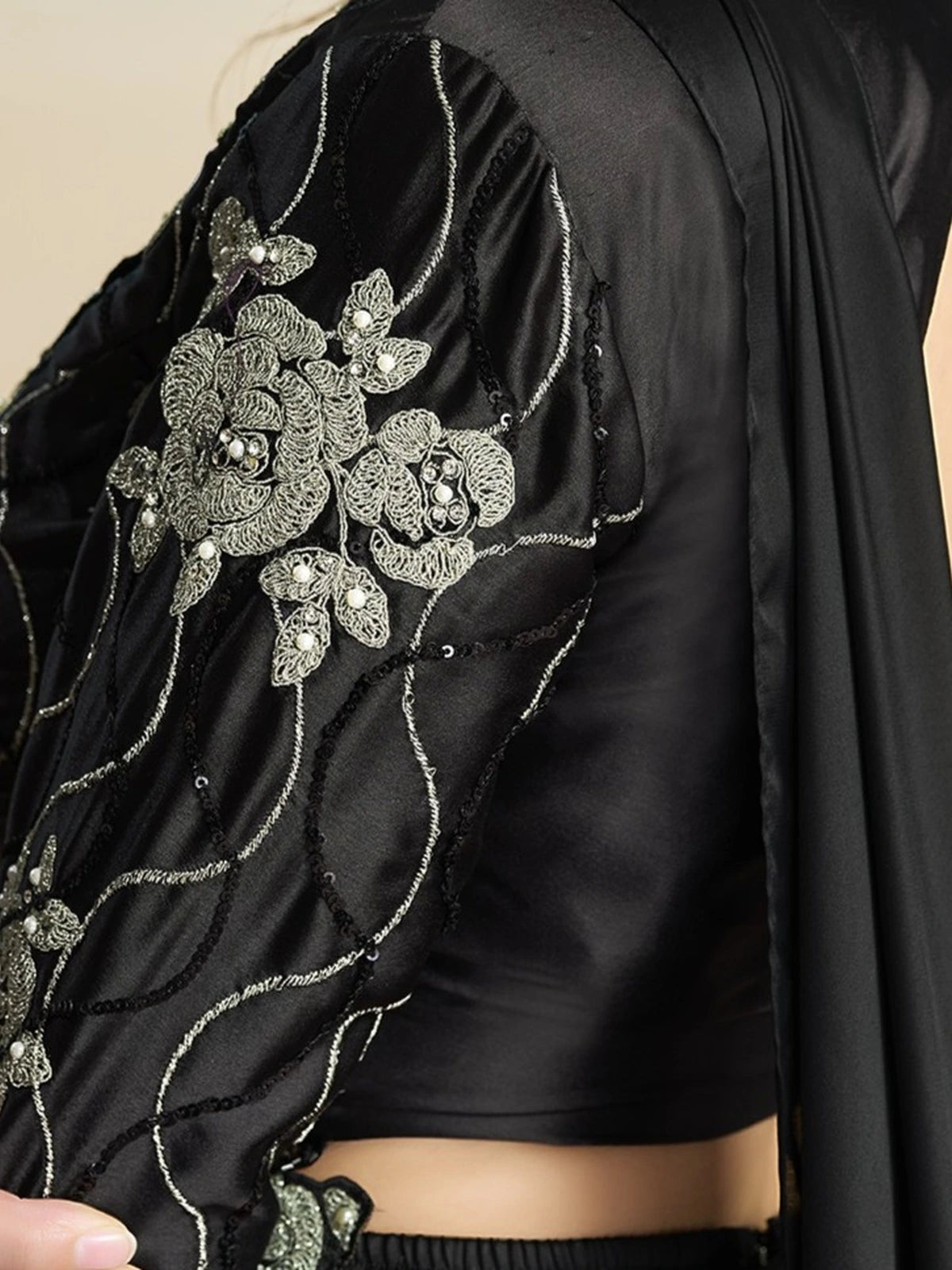 Tarani Swara black milky satin blouse close view with floral pearl stone embroidery