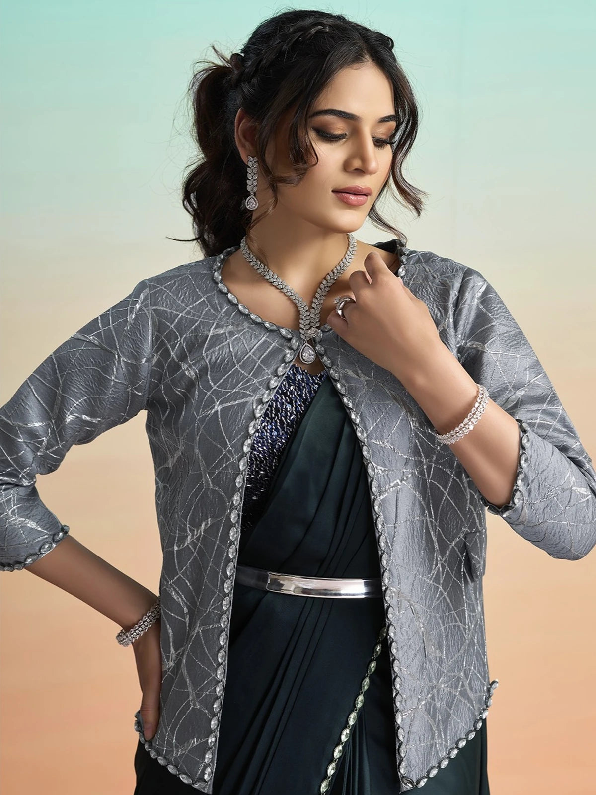 Tarani Prajakta black satin silk saree closeup with stone detailing and sequin embroidery