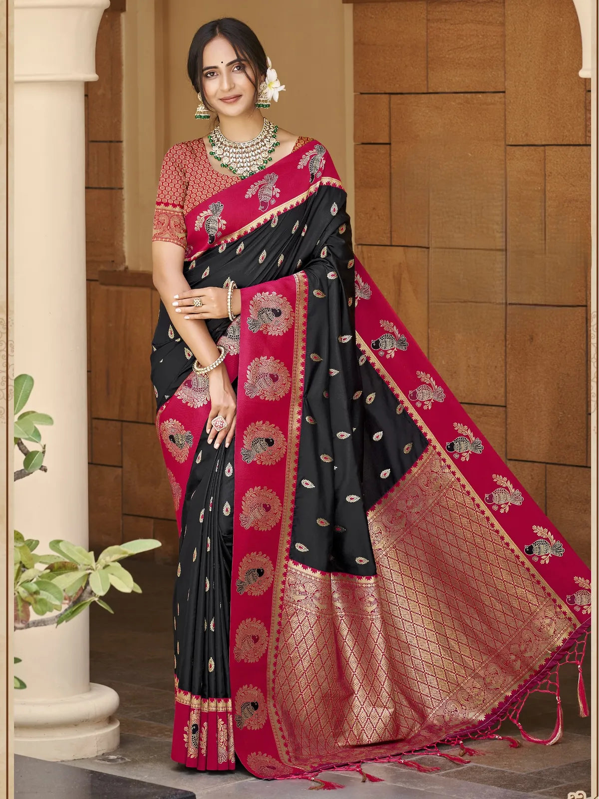 Tarani premium black silk saree with rich zari weaving and festive border full view