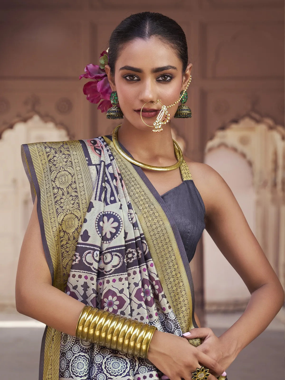 Tarani black silk saree upper body view with embroidery and tassle border