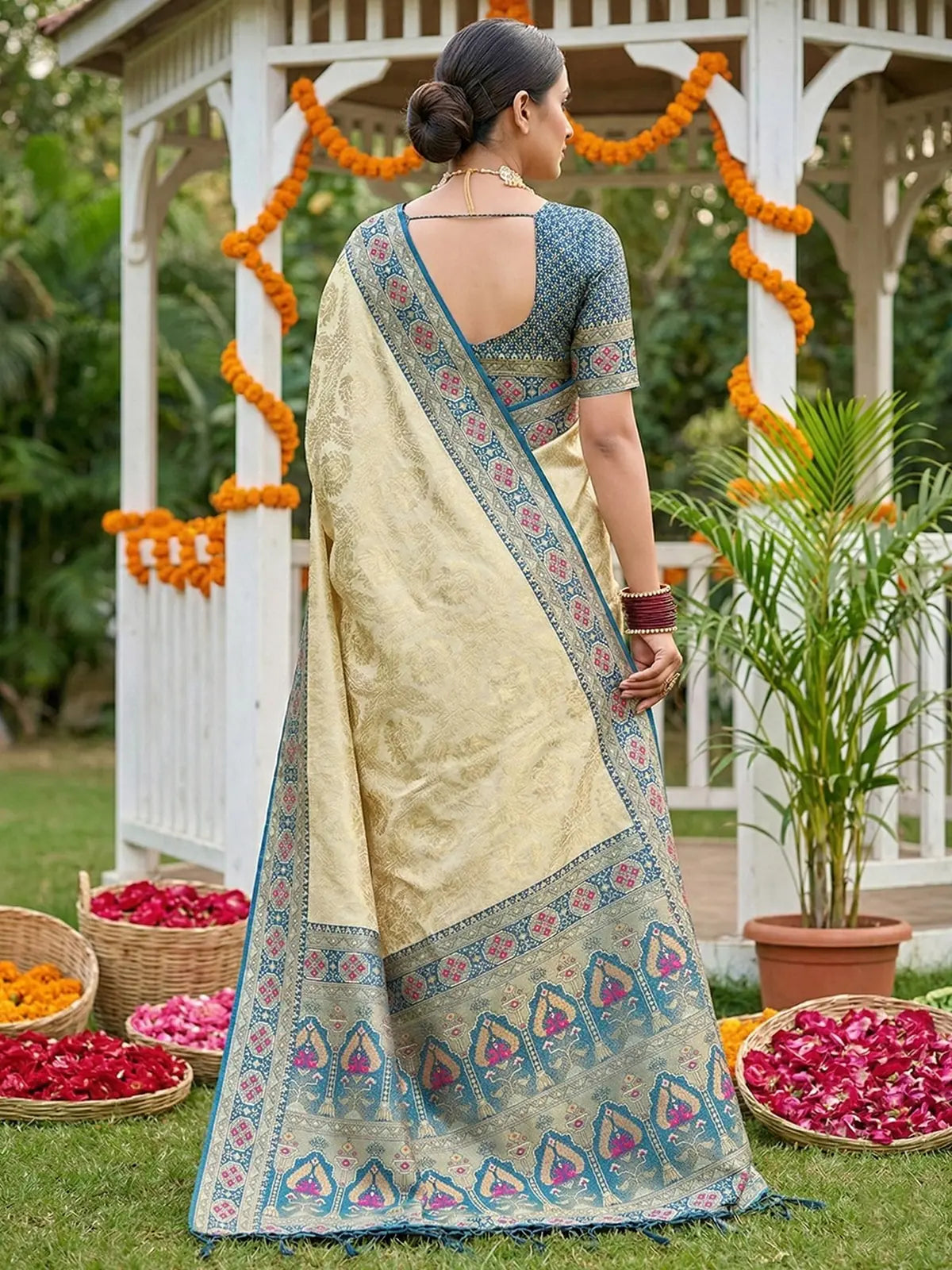Tarani Piyusha blue premium soft silk saree back view showcasing blouse and border