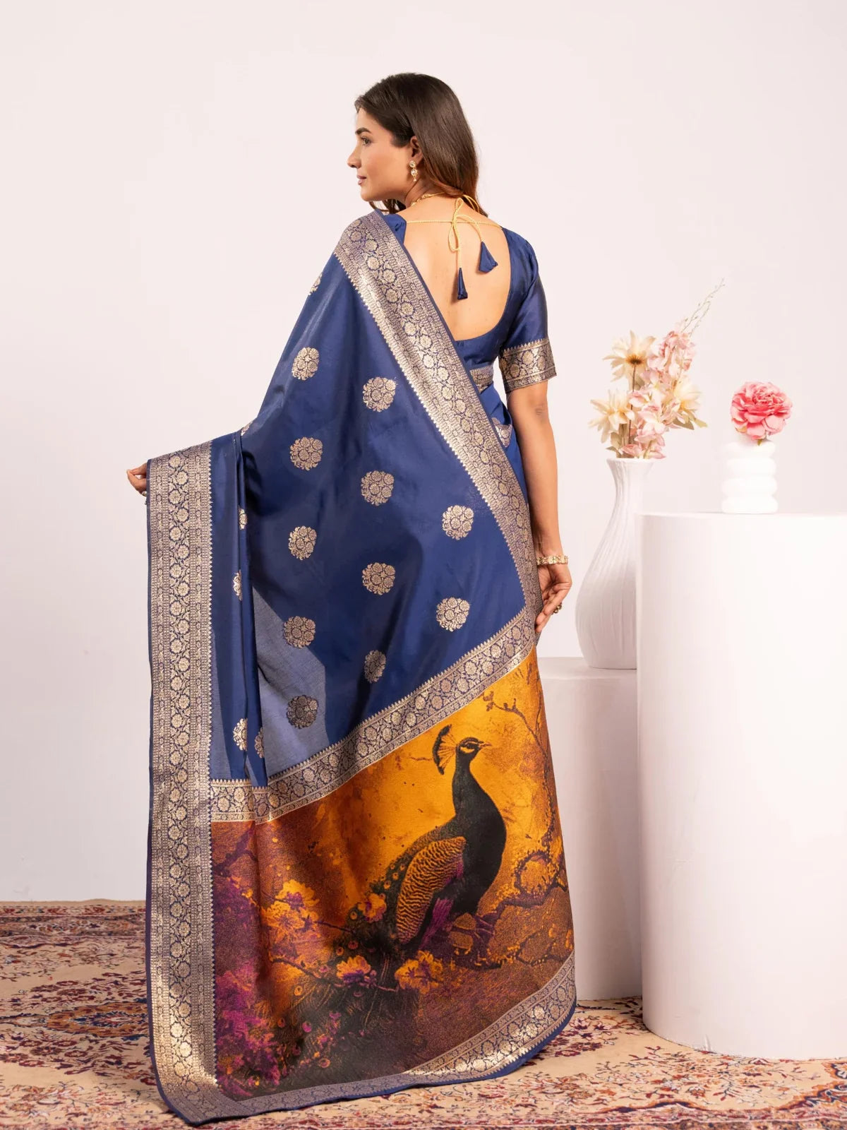 Back view of Tarani blue banarasi saree showing elegant fall and blouse pattern