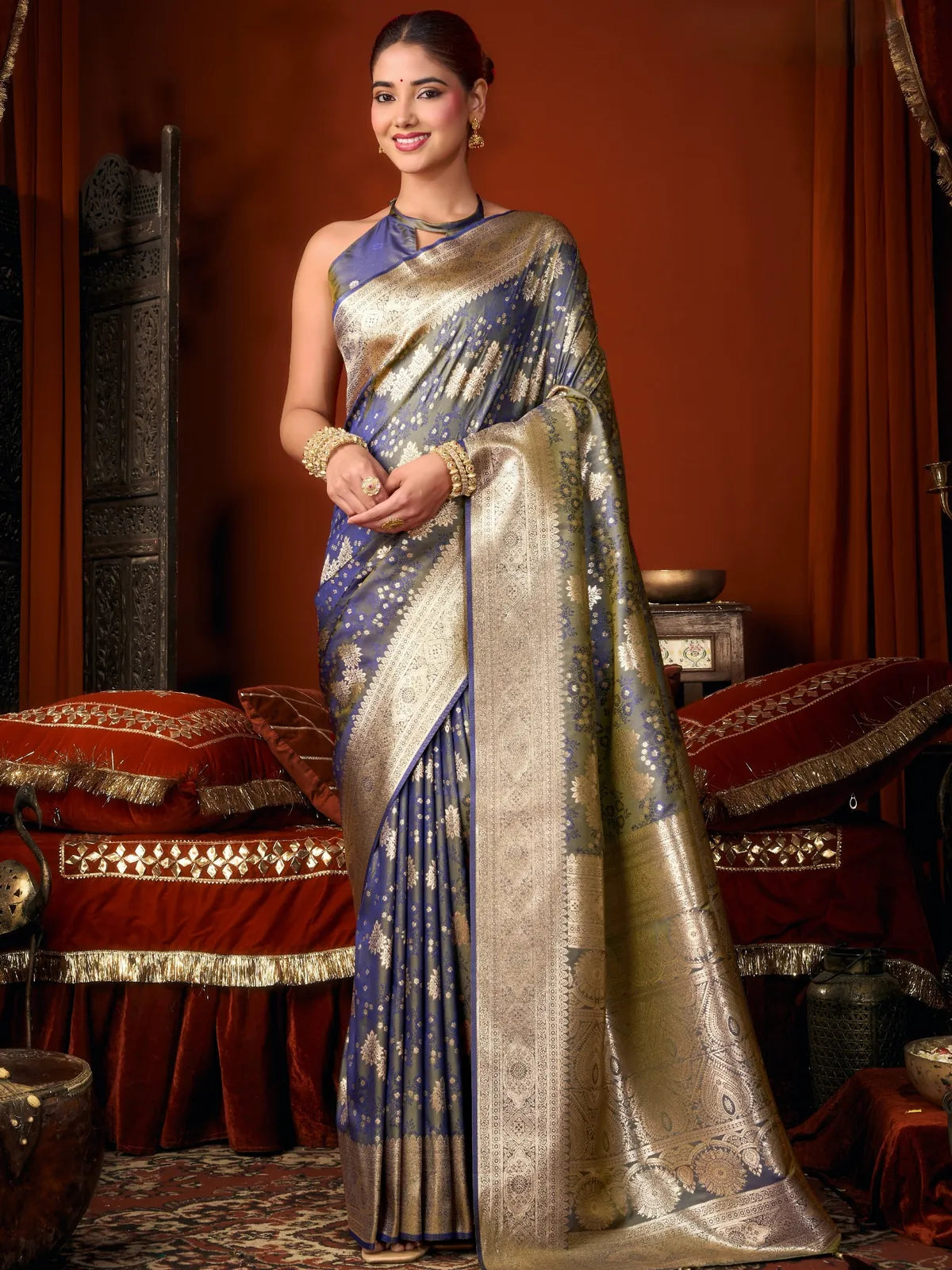Tarani premium blue self jacquard soft silk saree full front view with rich zari weaving and tassels