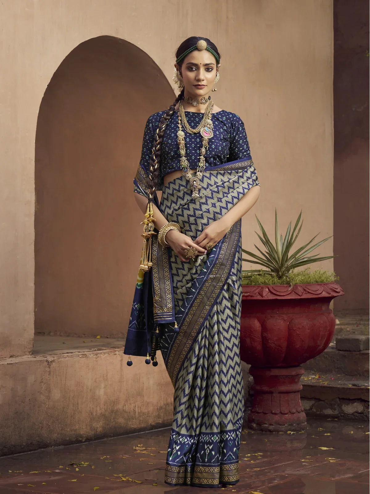 Tarani blue silk saree full view with patola design and embroidered border for festive wear