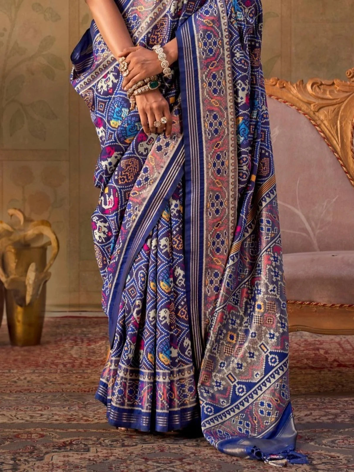 Tarani pallu view of royal blue silk saree with intricate woven Jari border