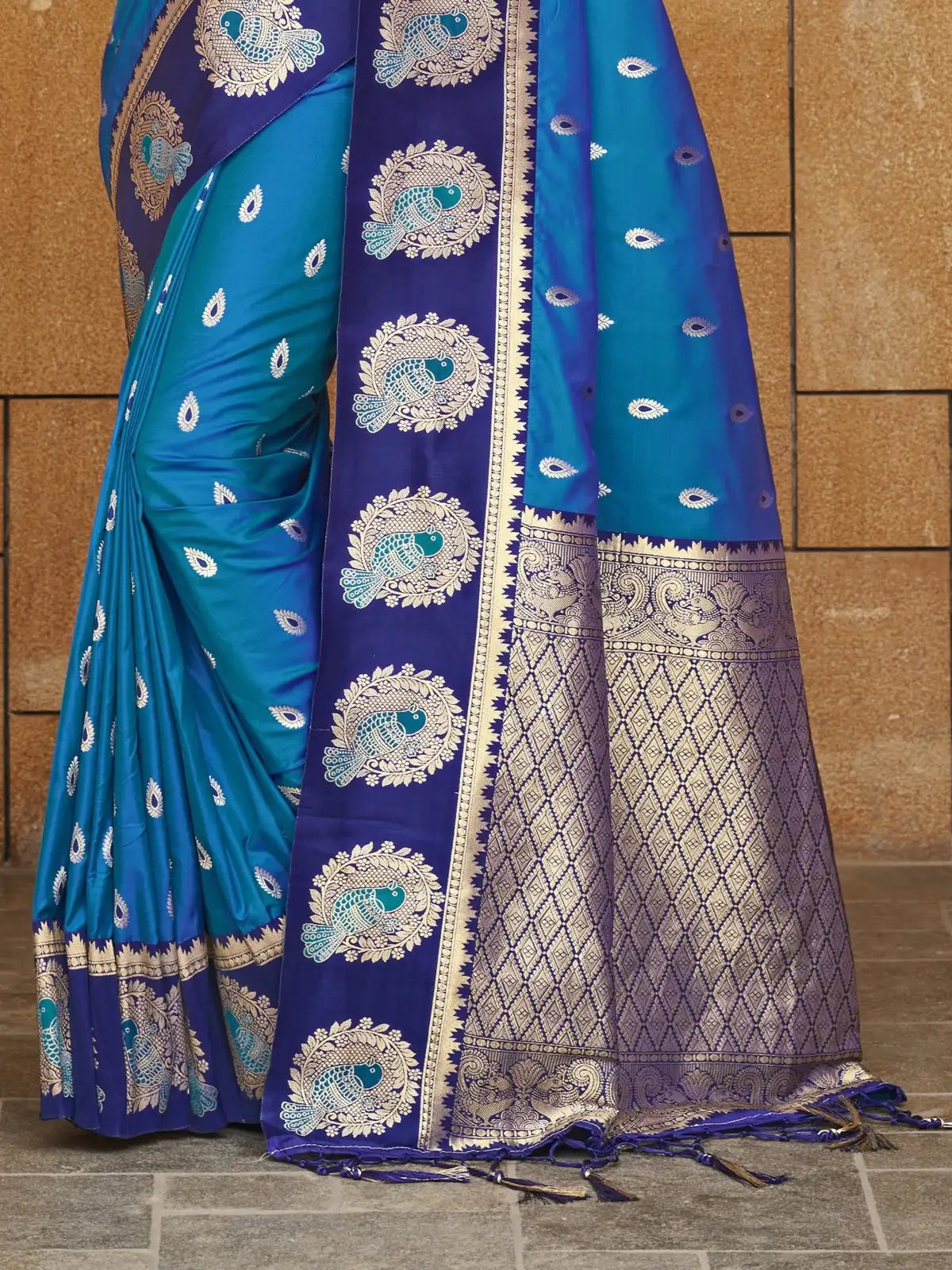 Tarani blue silk saree pallu view with zari weaving peacock motifs and contrast border detailing