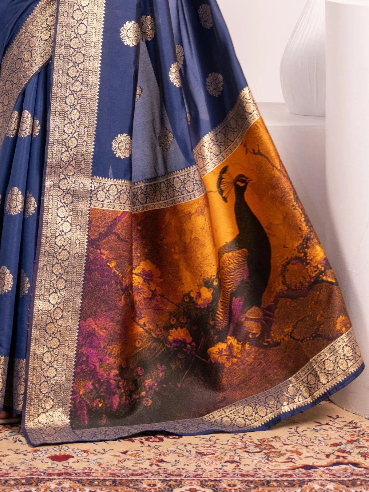 Tarani blue saree pallu with golden resham weave and exotic peacock design detailing