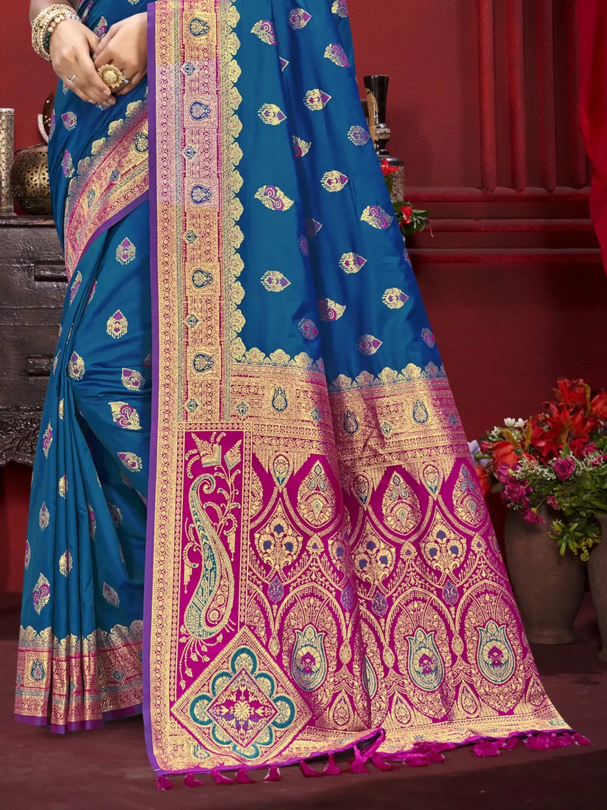 Tarani blue silk saree pallu close-up view showing intricate zari work