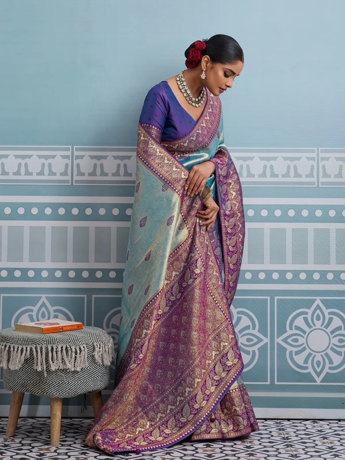 Tarani blue silk saree side view showing elegant drape and traditional weaving