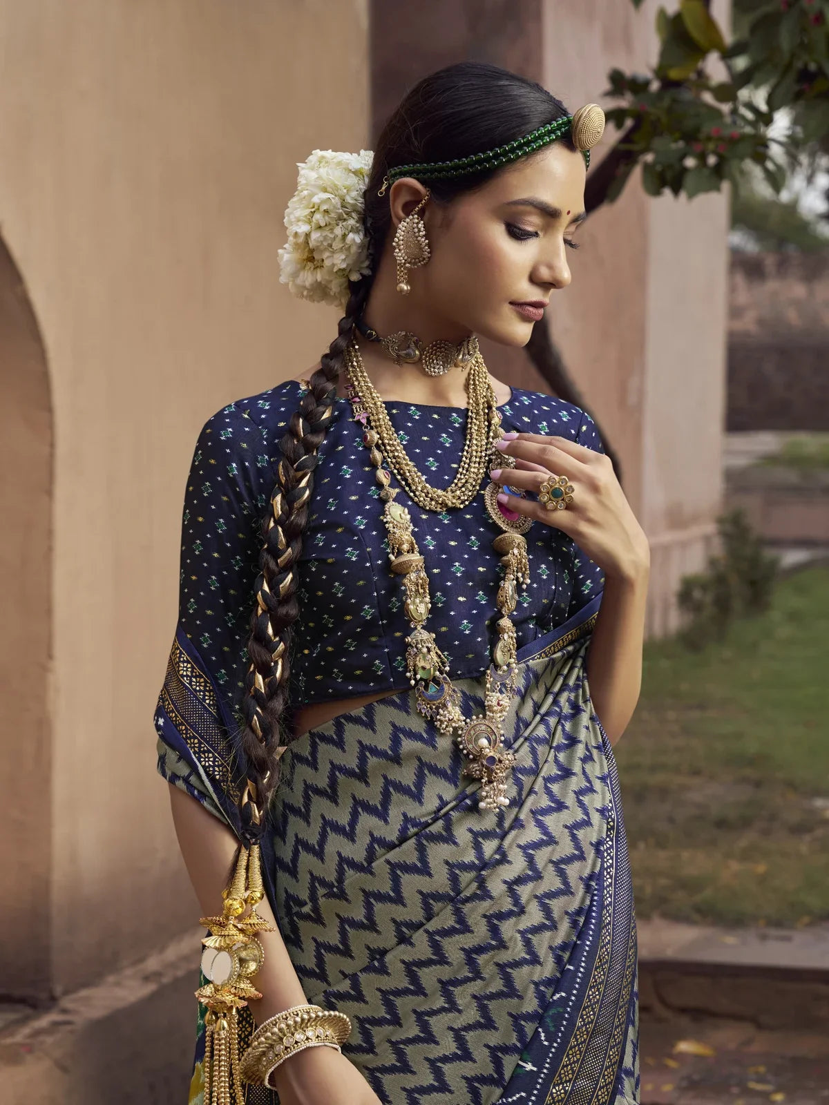 Tarani blue silk saree upper body view showing blouse and jewelry styling