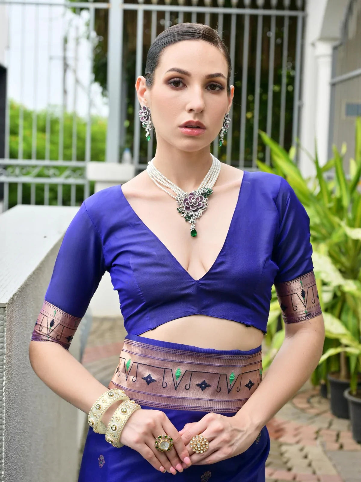 Tarani saree blouse close-up in royal blue with zari border and half sleeves – upper body view