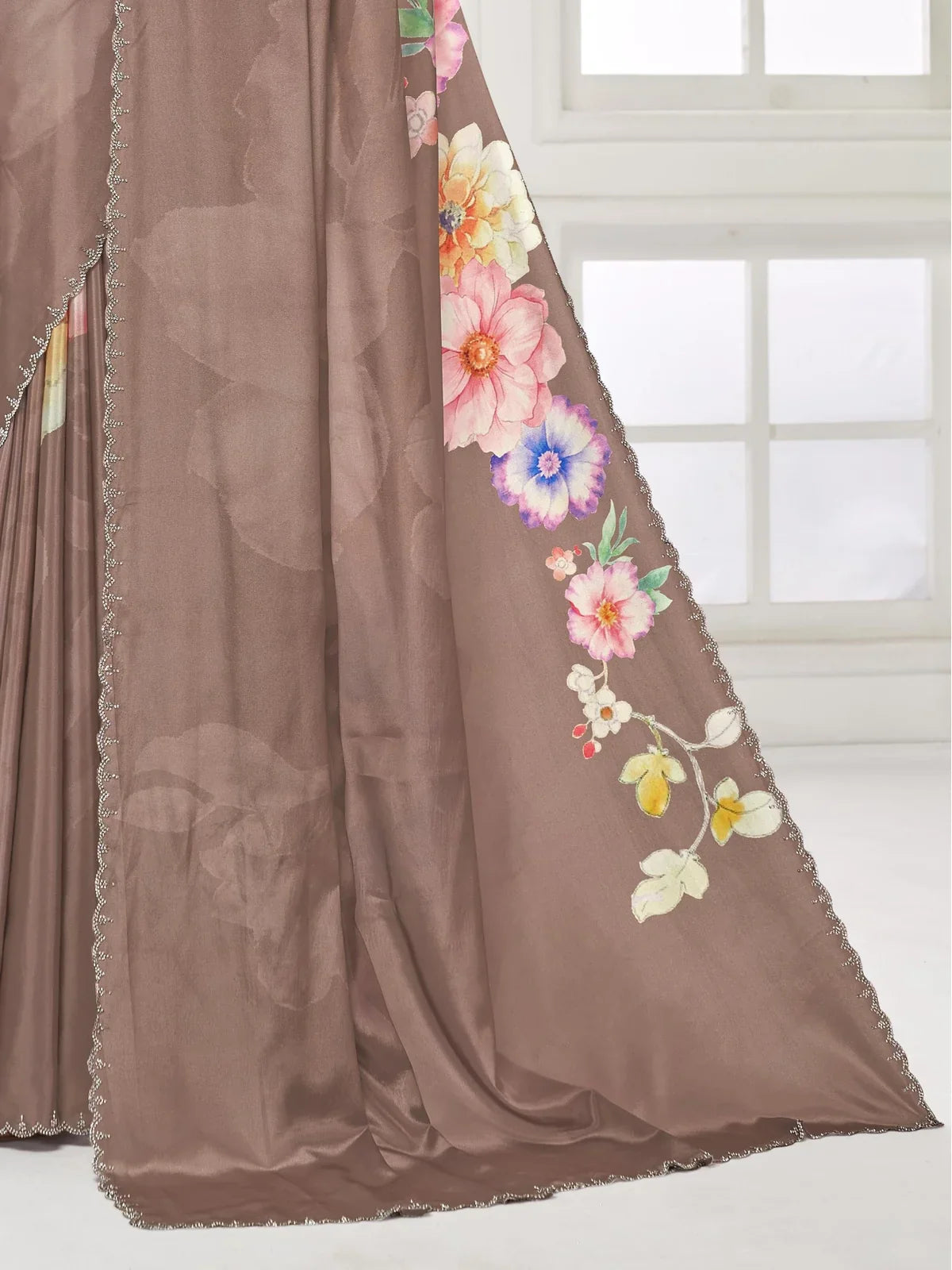 Tarani closeup of floral border and Swarovski crystal work on brown silk saree