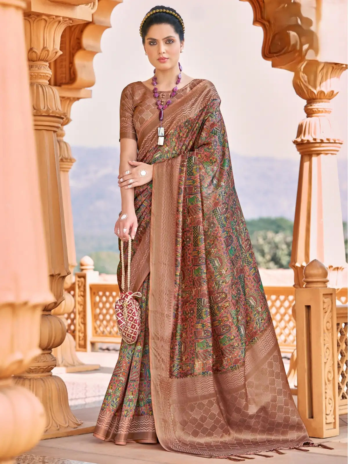 Tarani brown silk saree full view with woven detailing perfect for party wear