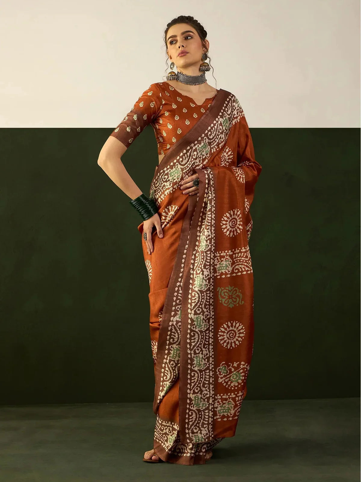 Tarani brown Dola silk saree with ethnic motif design and matching blouse perfect for wedding and festive wear