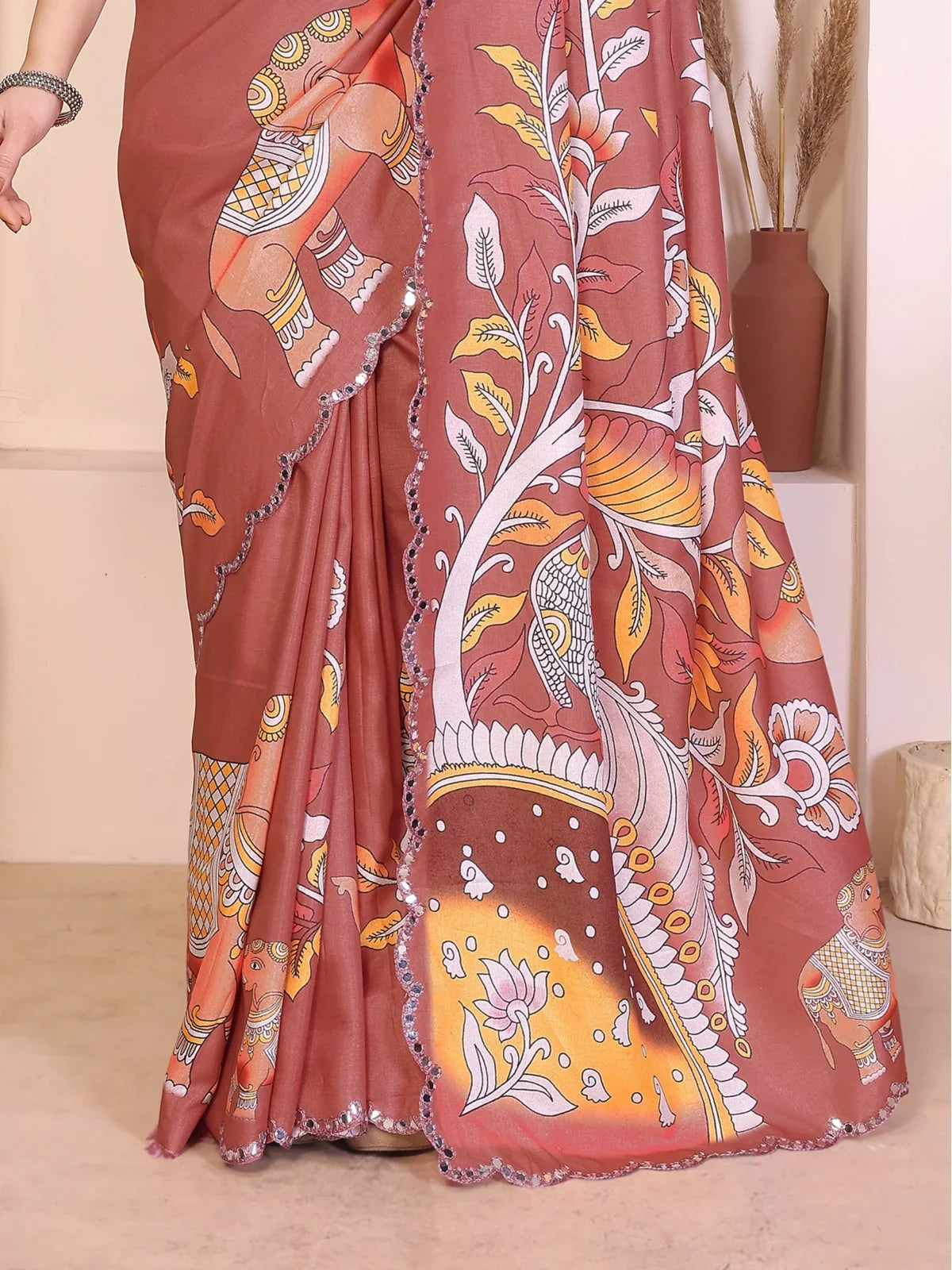 Tarani Manipuri silk saree pallu featuring kalamkari art and mirror border