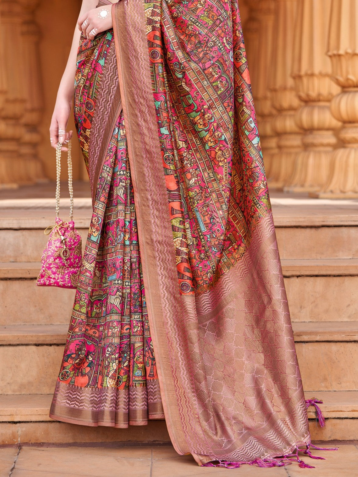 Tarani brown silk saree pallu view showing artistic motifs and zari border craftsmanship