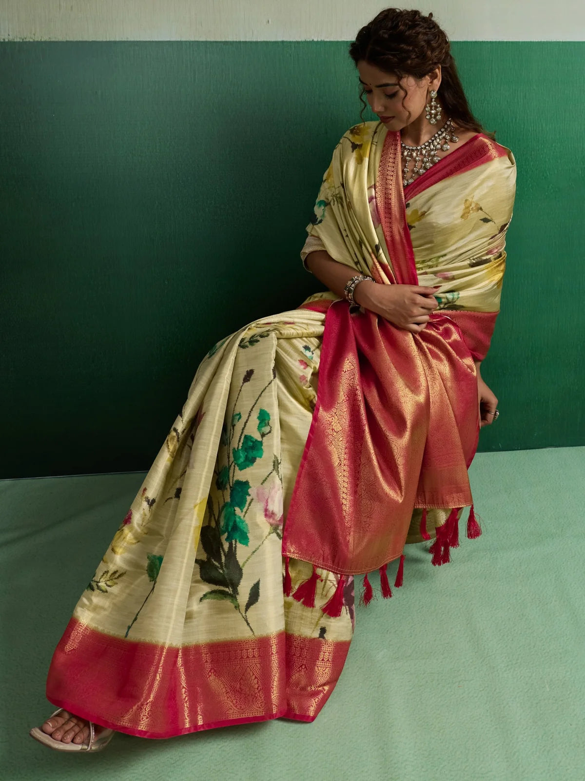 Tarani side view of cream floral Kanjivaram Tissue Silk saree