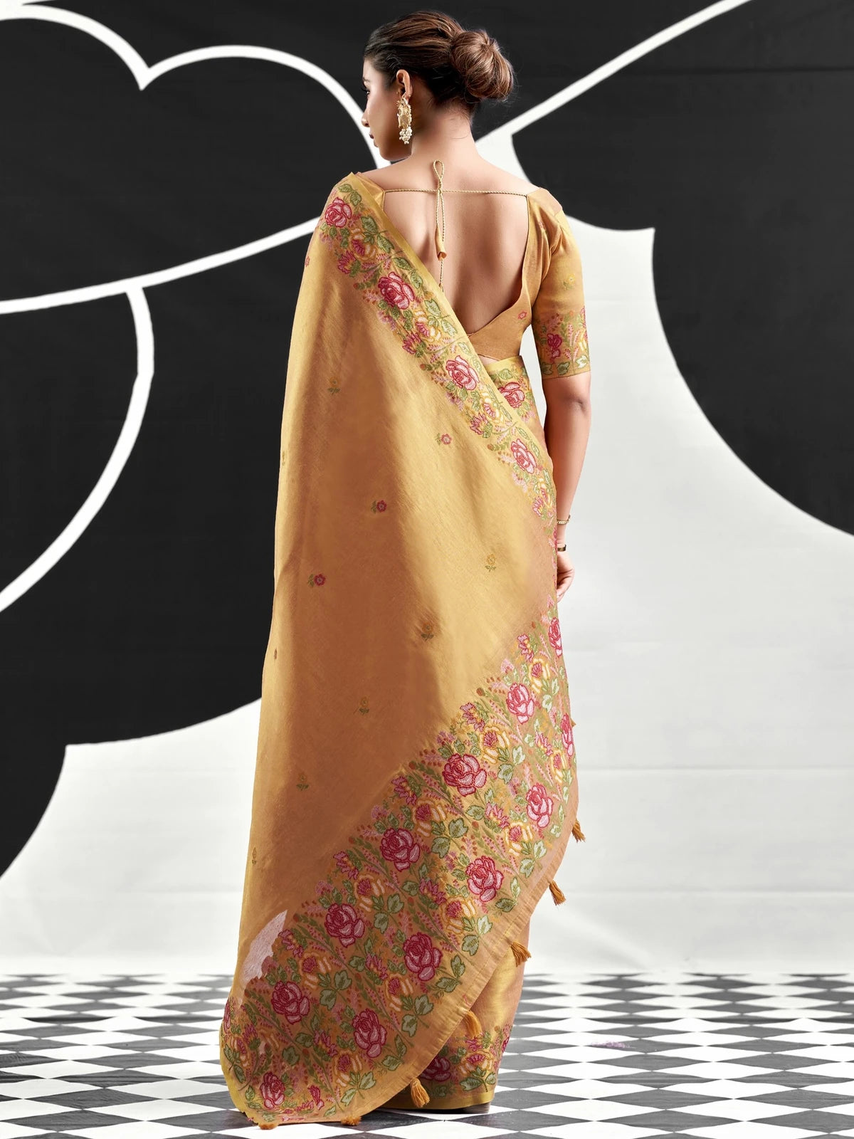 Tarani golden Tissue Silk saree back-view with floral woven border