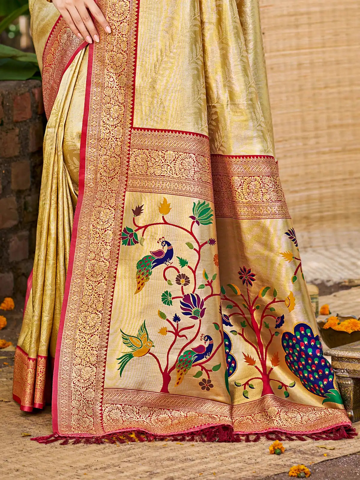 Tarani golden Kanjivaram silk saree closeup view showing woven detailing and border