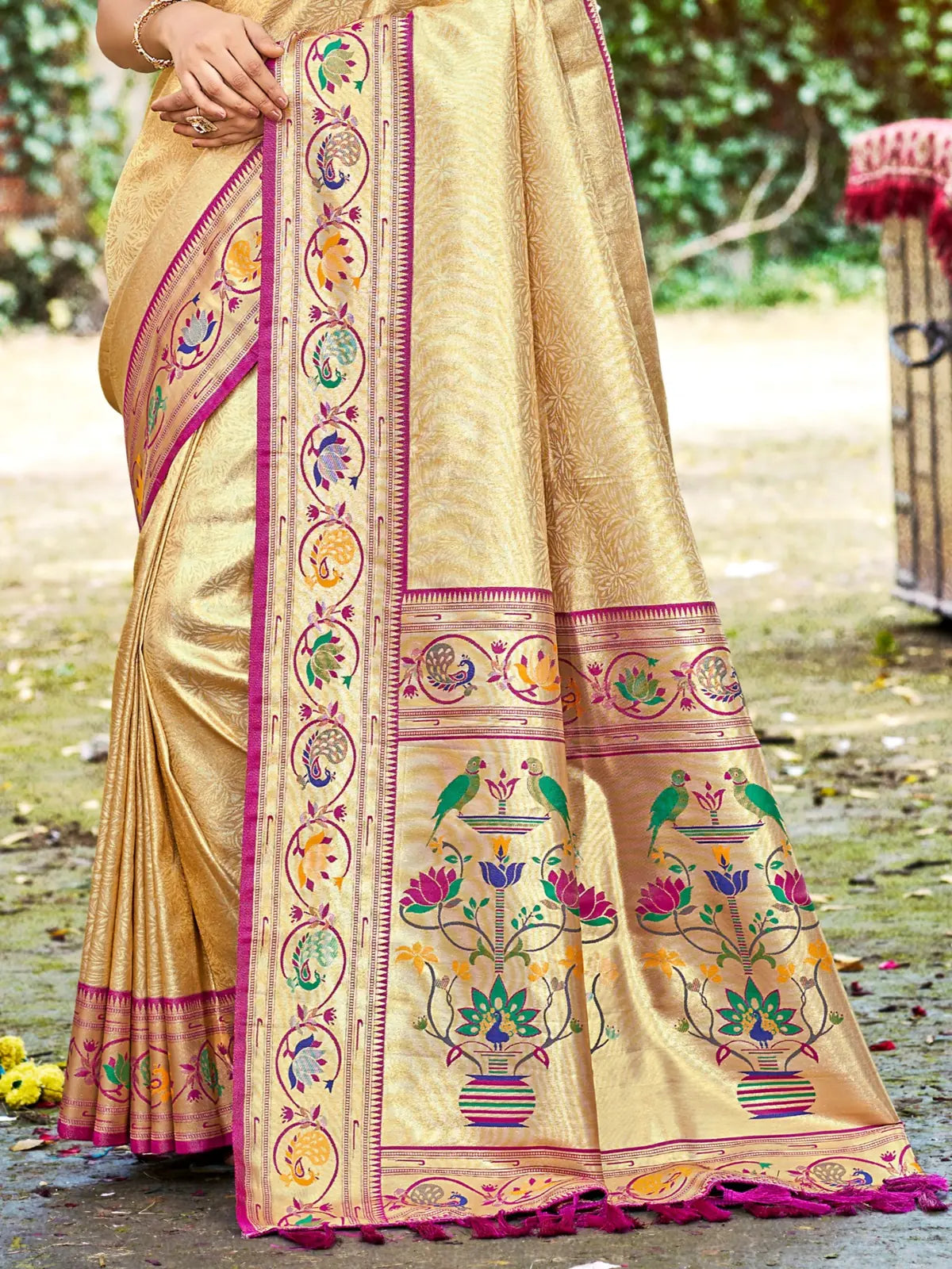 Tarani golden Kanjivaram silk saree pallu view with traditional woven motifs