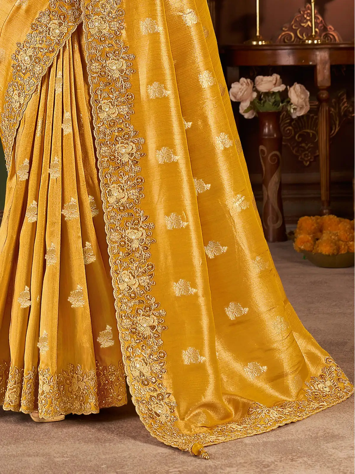 Tarani designer golden zari saree with detailed border and pallu close-up view for festive wear