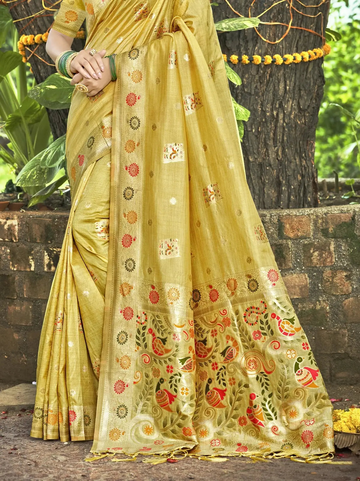 Tarani golden Kanan silk saree pallu view with multicolour motifs and intricate border for festive wear
