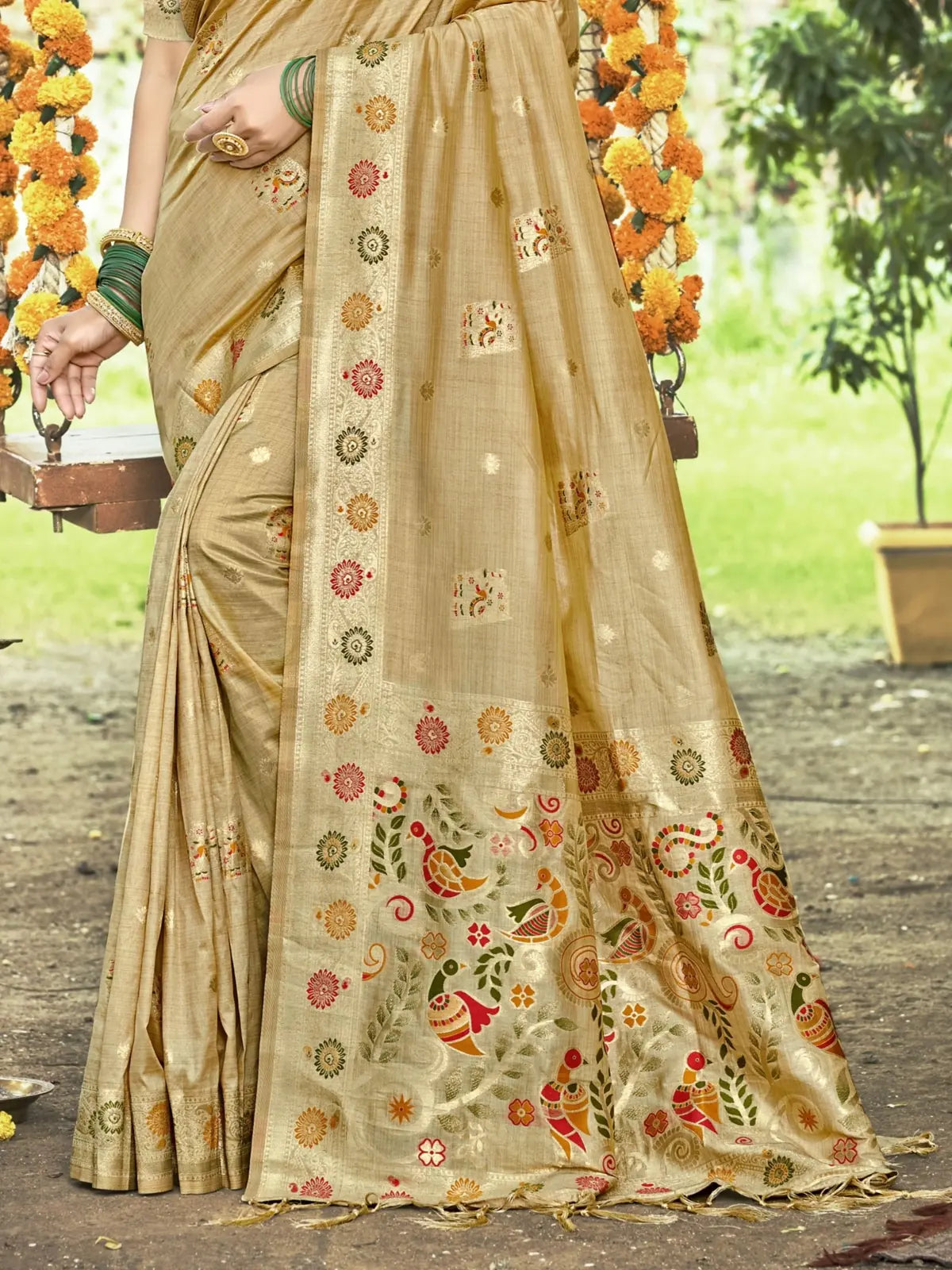 Tarani golden silk saree close pallu and border with colorful bird and floral weaving detail