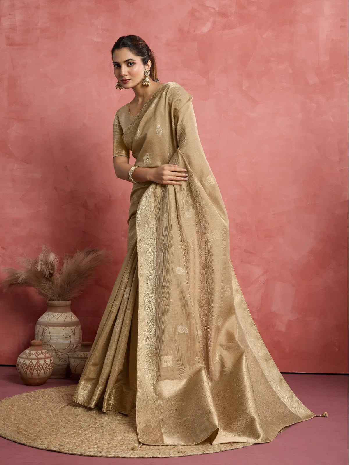 Tarani golden silk saree side view showcasing elegant woven border