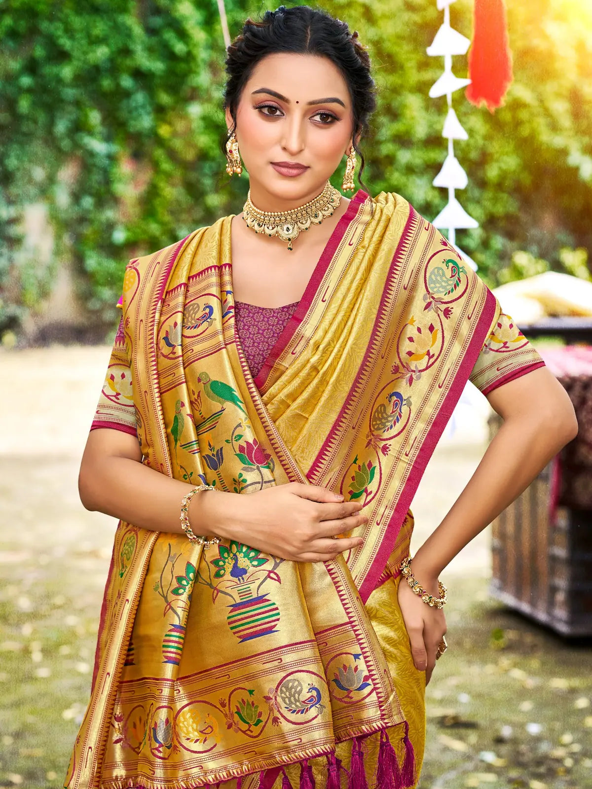 Tarani golden Kanjivaram silk saree upper body view showing woven border and blouse