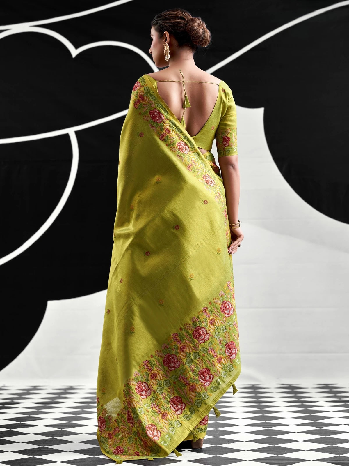 Tarani green tissue silk saree back-view with floral woven border and blouse piece