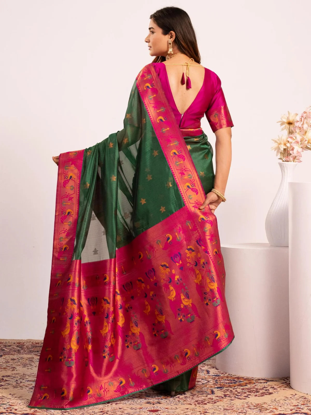 Tarani premium green soft tissue silk Paithani saree with zari woven border back-view