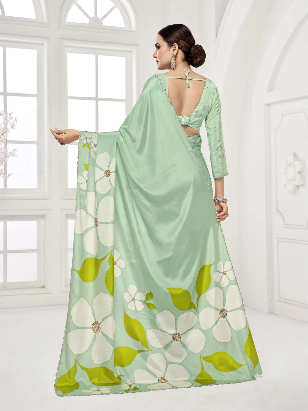 Tarani back pose of green silk digital printed saree with soft flow and stylish back blouse design