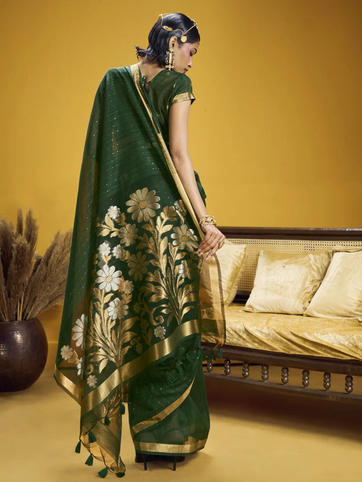 Back view of Tarani green silk saree showcasing floral zari pallu design