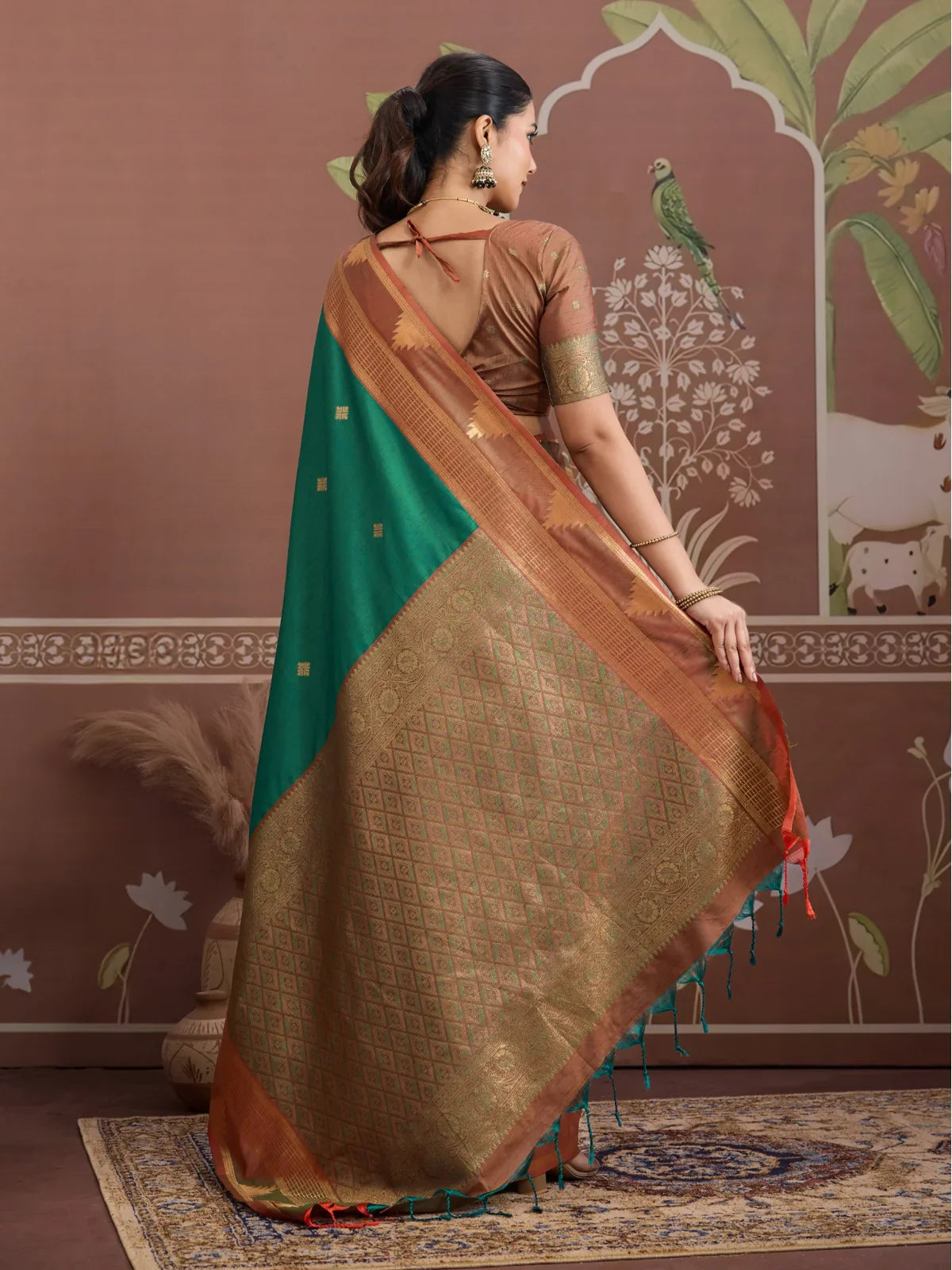 Tarani green saree full back view with pallu drape and blouse detailing