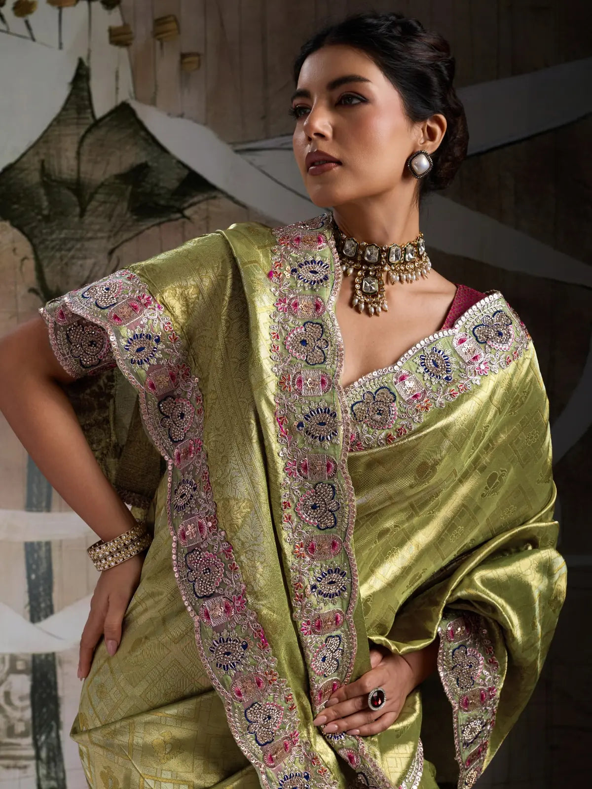 Tarani olive green Banarasi jacquard silk saree closeup view of embroidered border and pallu work