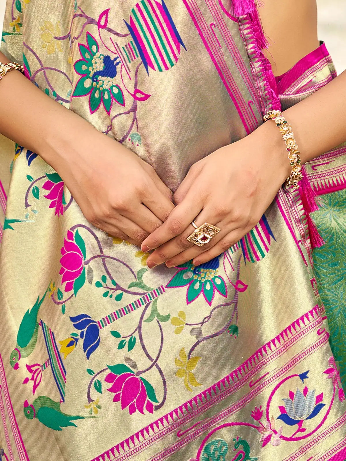 Tarani green Kanjivaram silk saree closeup of rich Paithani weaving and border details