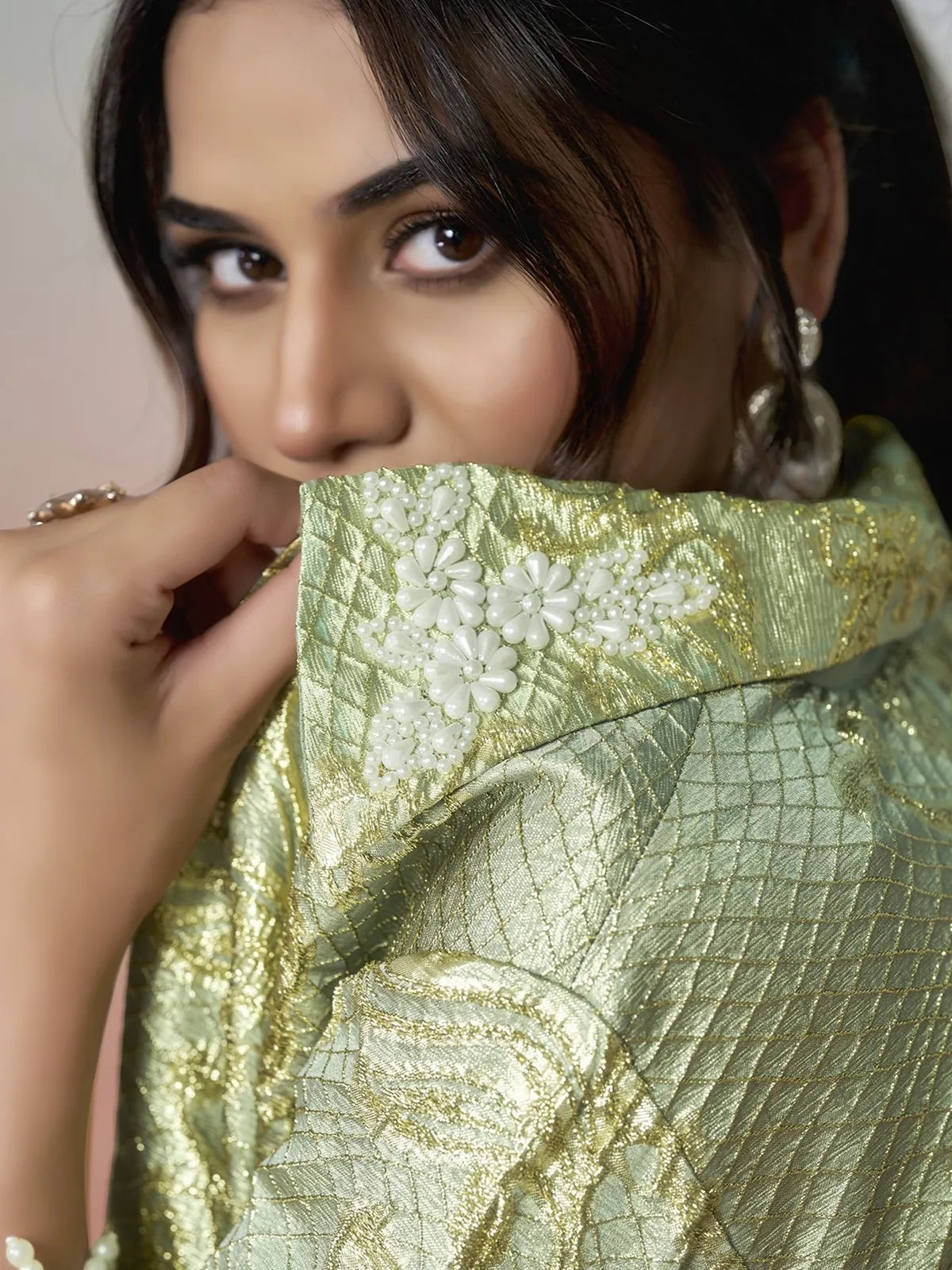 Tarani Padmika jacquard silk jacket closeup with pearl floral detailing