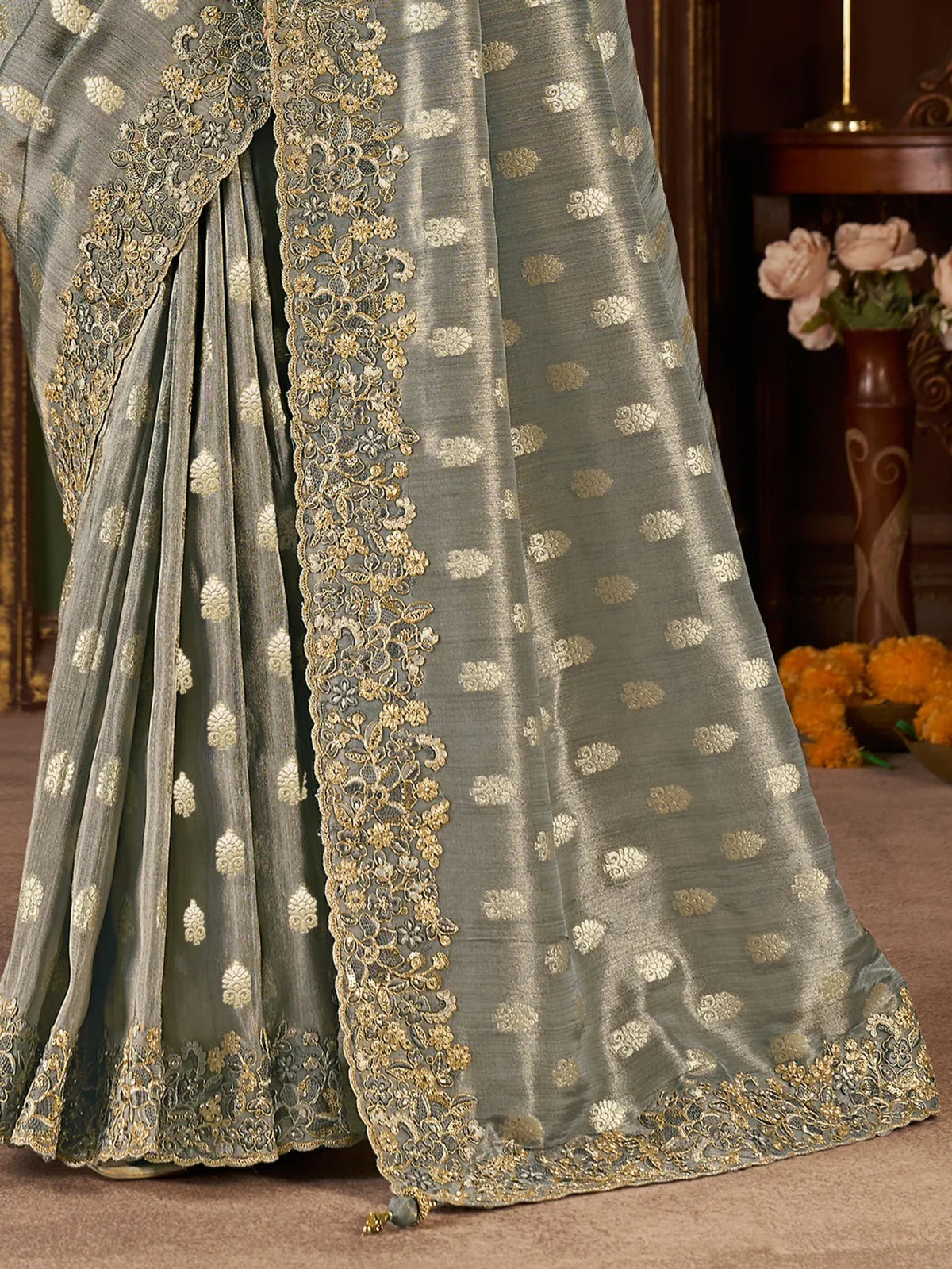 Tarani silk saree closeup with golden embroidery and soft shine detailing