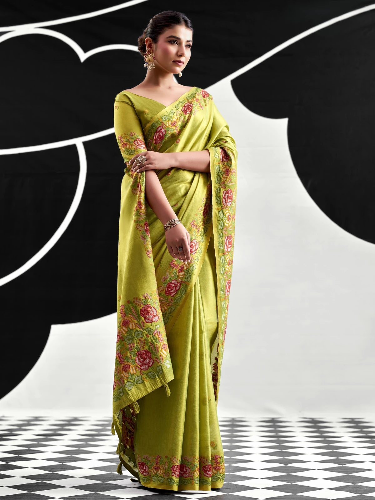 Tarani green tissue silk saree front-view with floral woven border and blouse piece