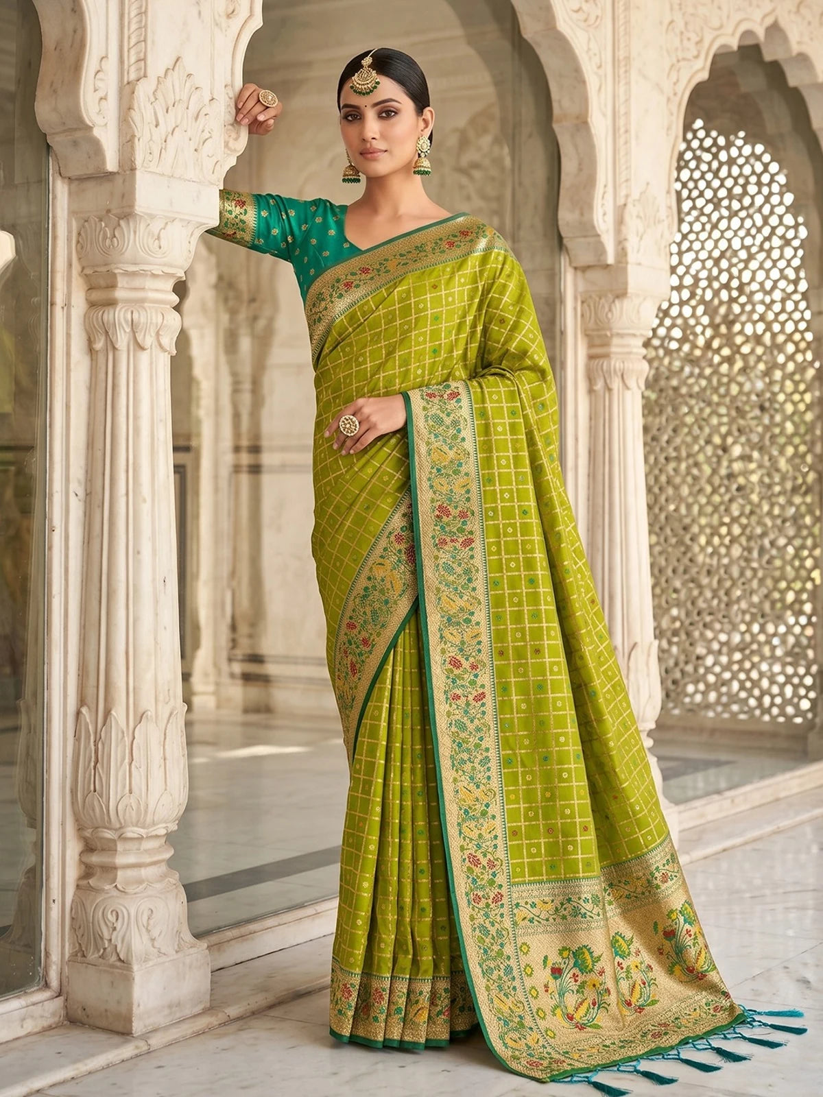 Tarani Arunika premium green Banarasi silk saree elegant front drape view