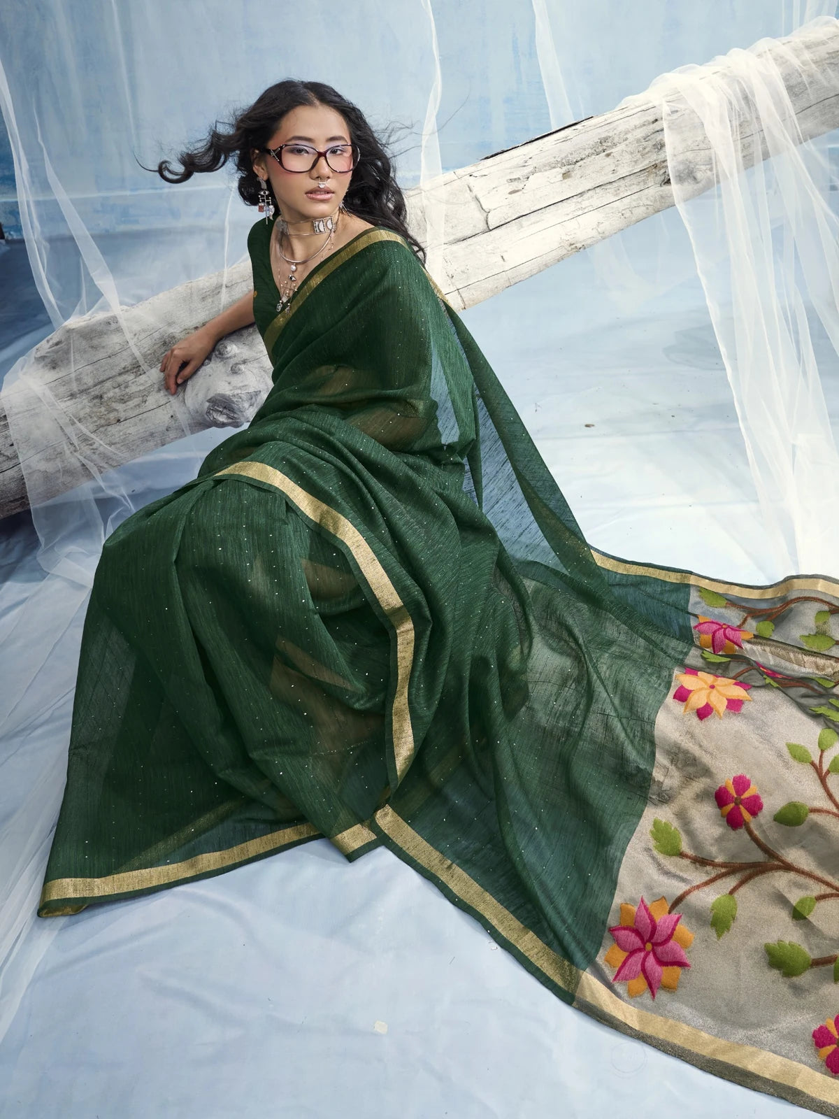 Tarani Tanisha pure Munga silk green saree front view with graceful drape and woven detailing