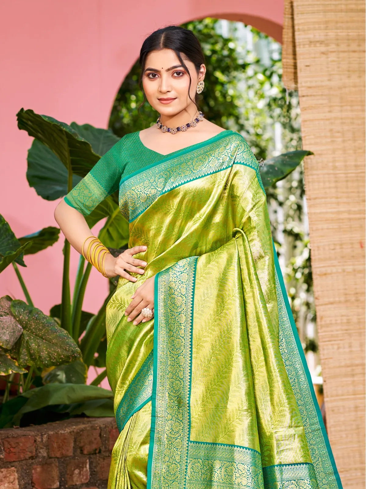 Tarani elegant green Kanjivaram silk saree front view for weddings and festive wear