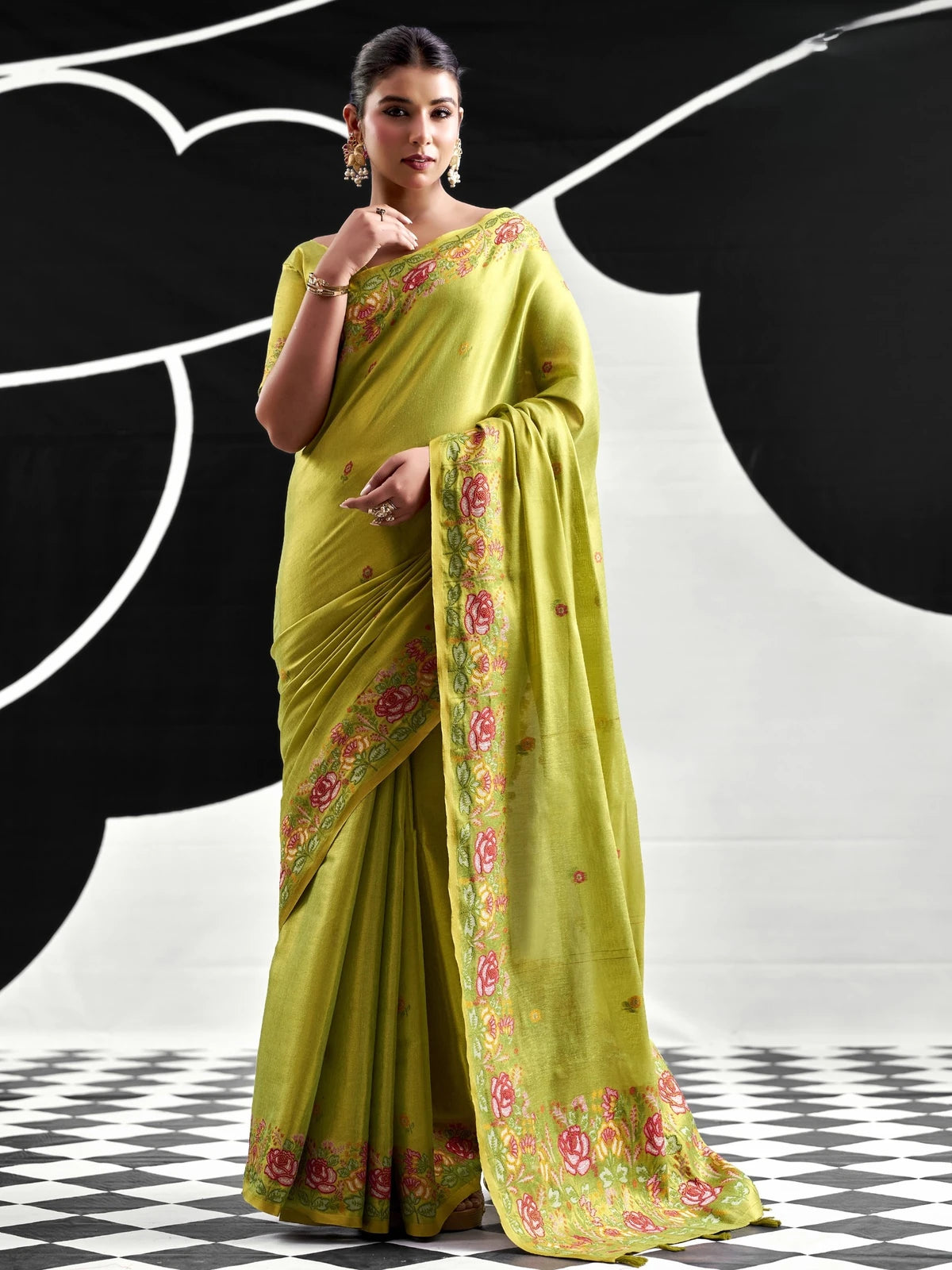 Tarani green tissue silk saree full-view with floral woven border and blouse piece