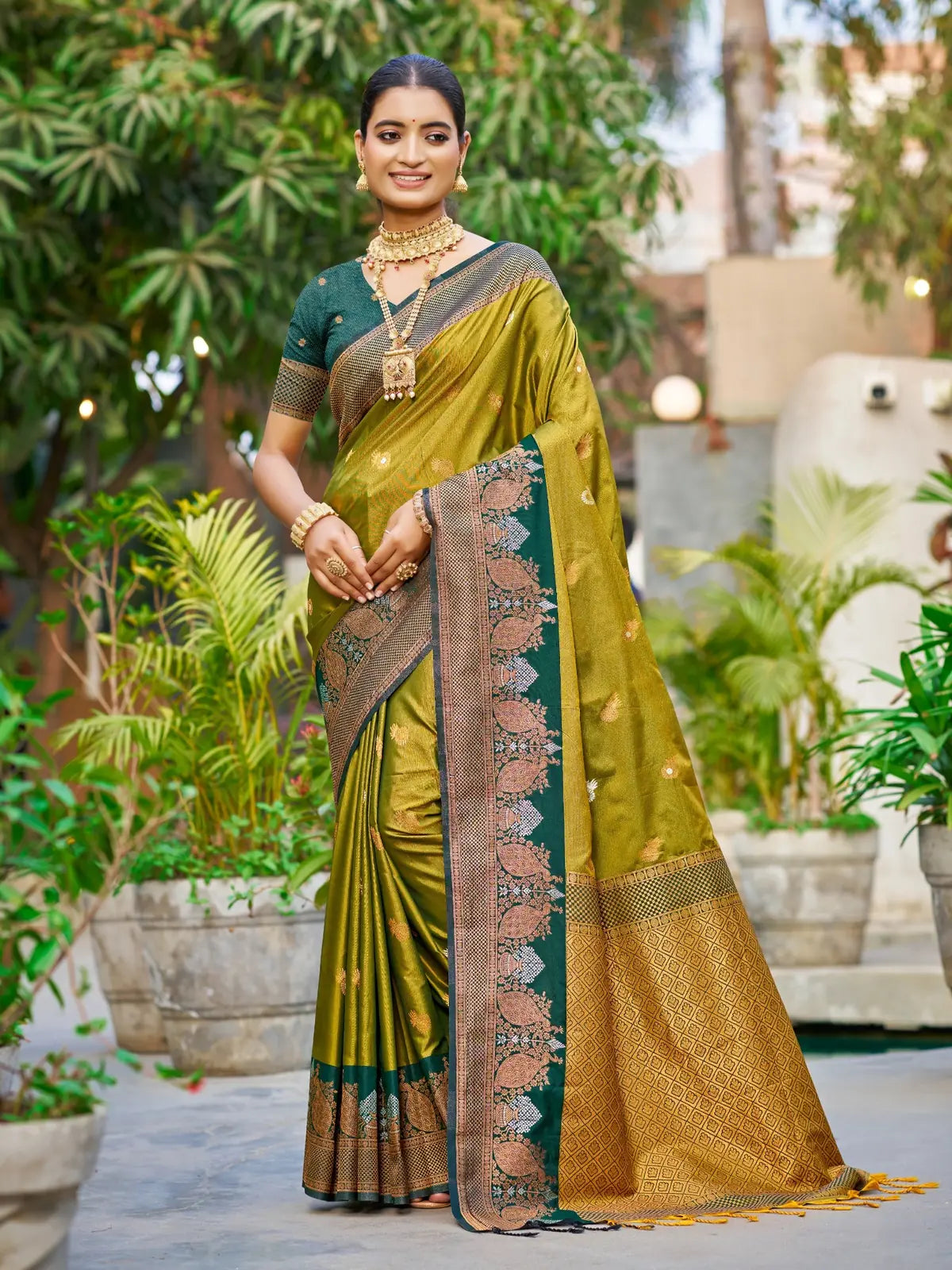 Tarani green soft silk saree with zari weaving and contrast border full view for festive wear