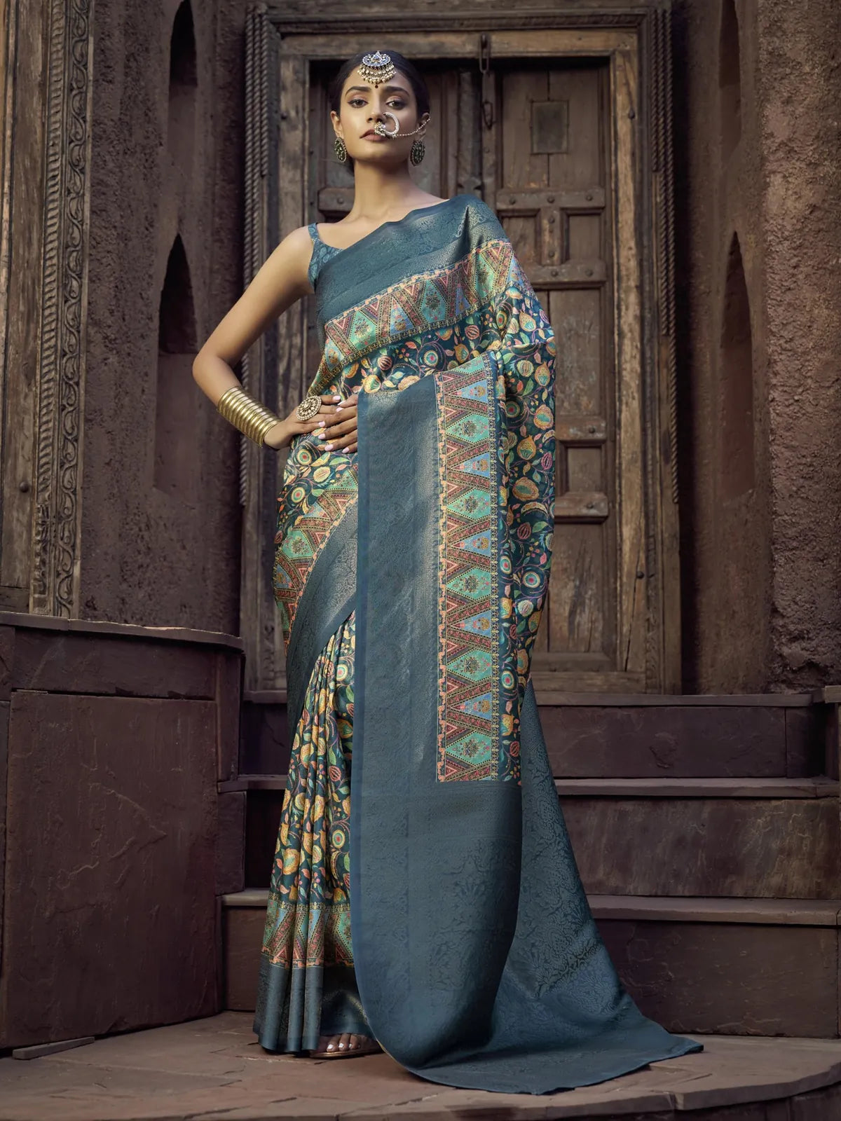 Tarani premium green silk saree with traditional woven pallu and blouse for festive wear