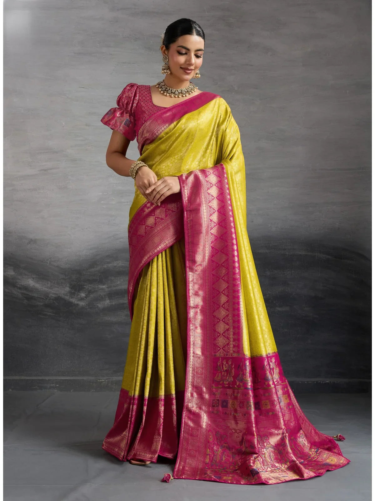 Tarani elegant green kanjivaram saree with pink border and traditional pallu full view