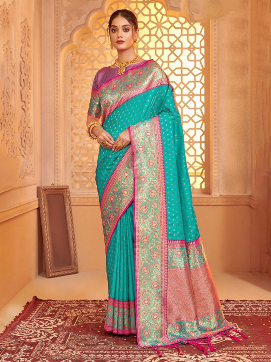 Tarani green silk saree full view with contrast border for festive and party wear