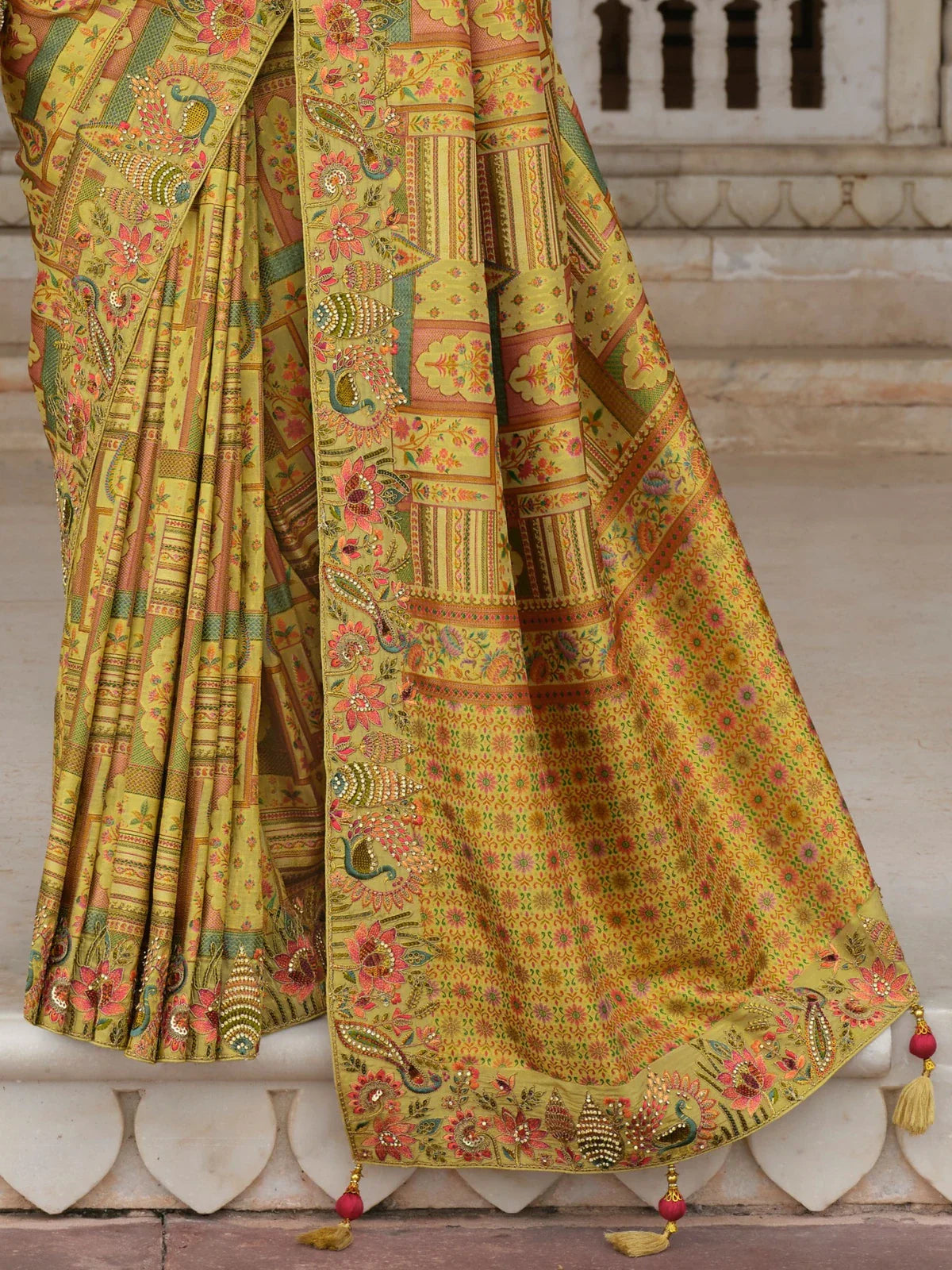 Tarani designer saree pallu view with sequin detailing and floral embroidery highlights