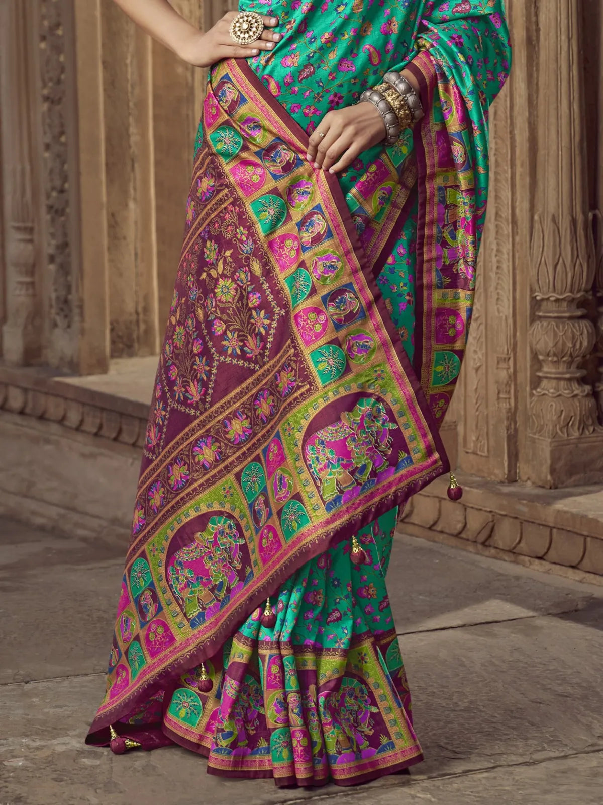 Tarani rich silk saree pallu view highlighting border and traditional prints